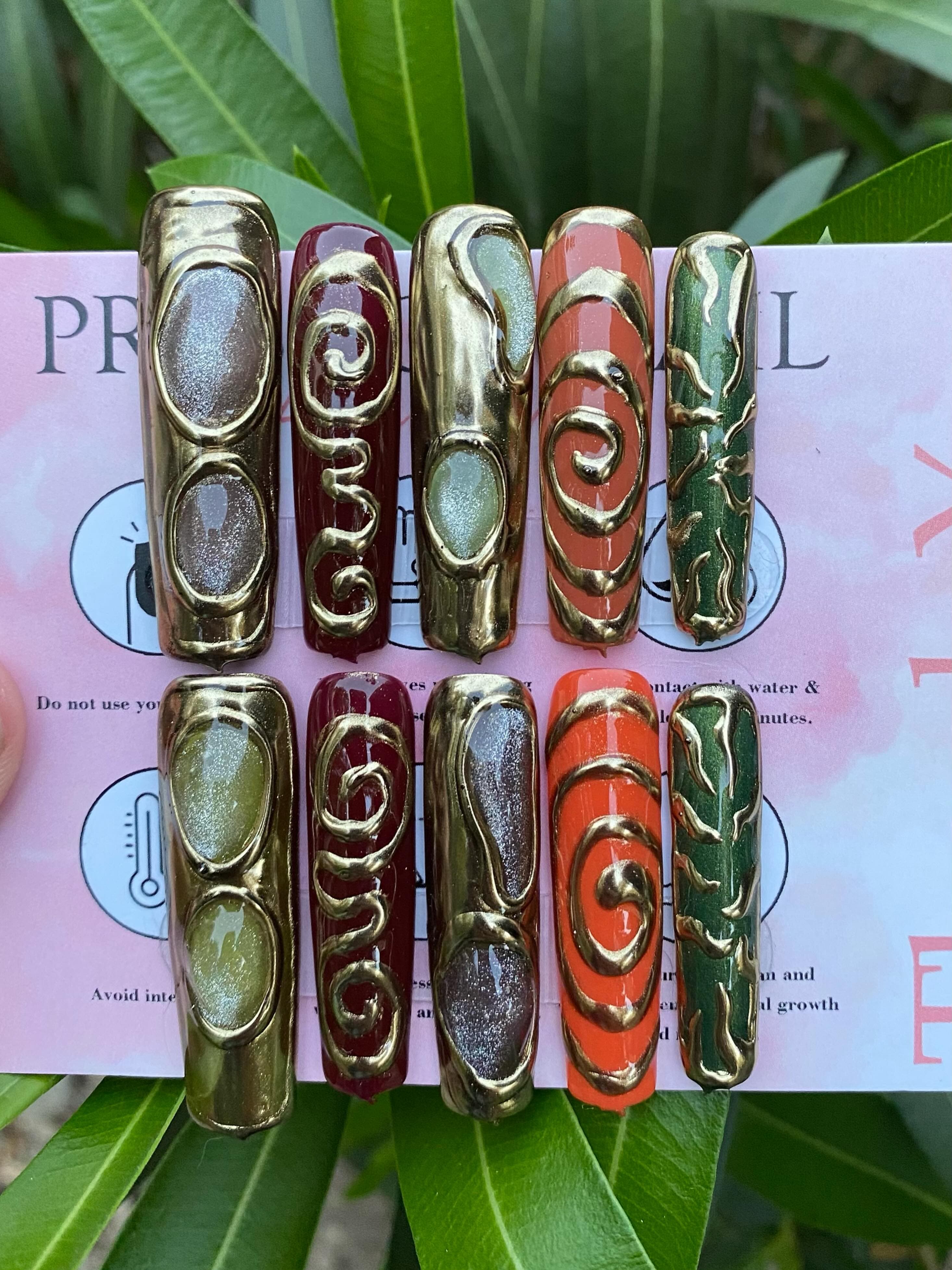 Hippie custom press-on set with sculpted gold swirls
