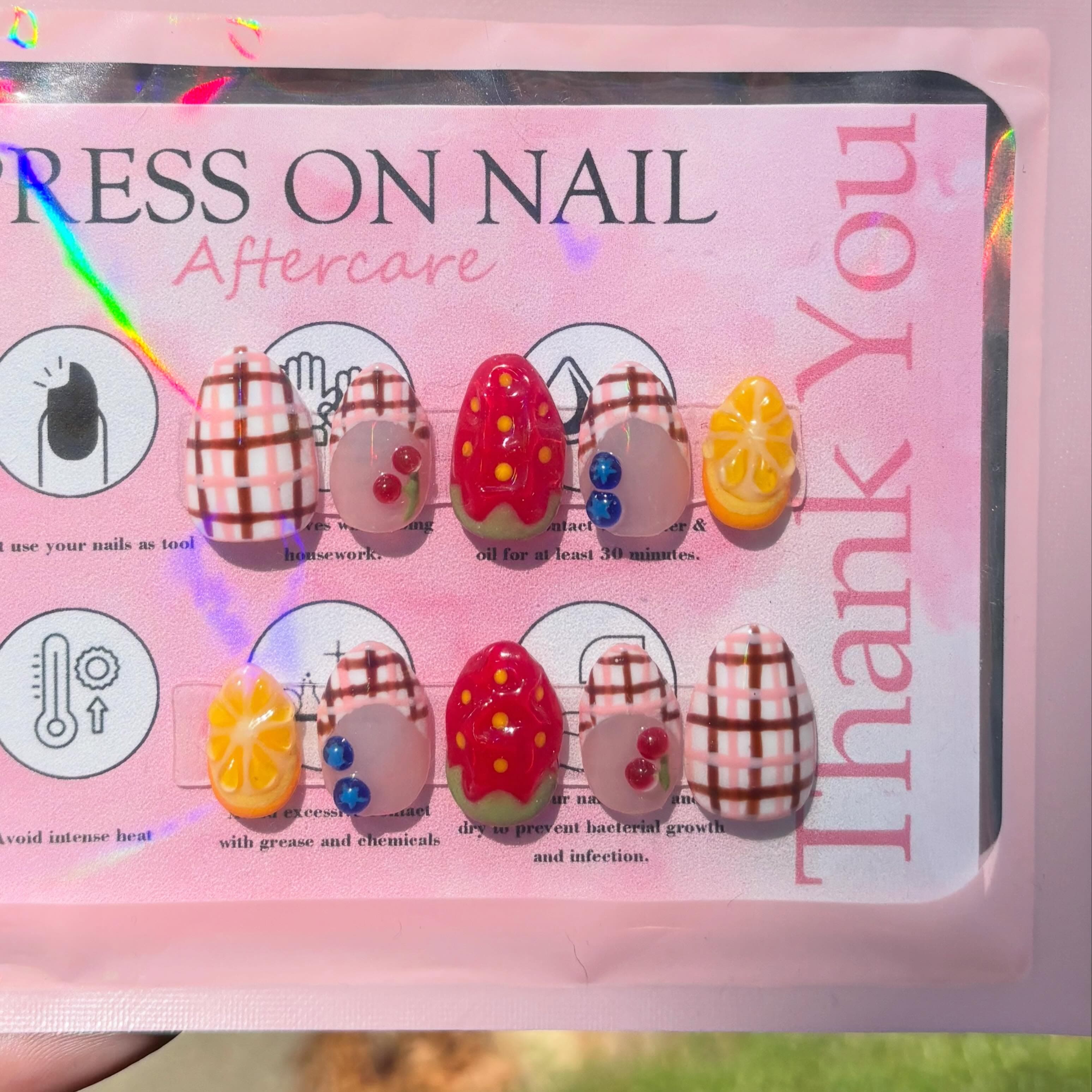 Picnic Perfect handmade press-on nail set with fruit and gingham designs